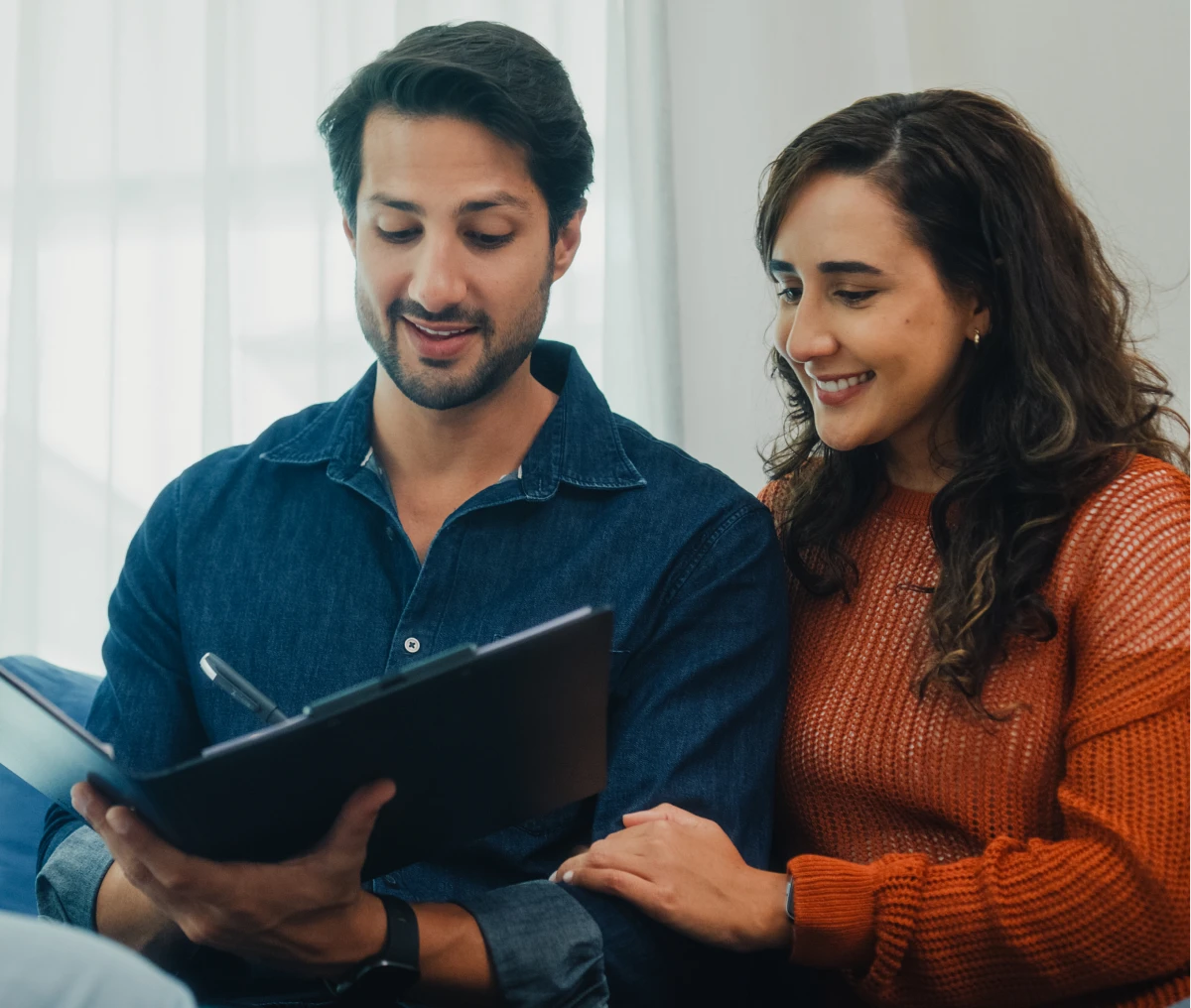 Couple reviewing documents together